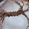 brown wire tree trunk double wrapped with a tick strand of wire